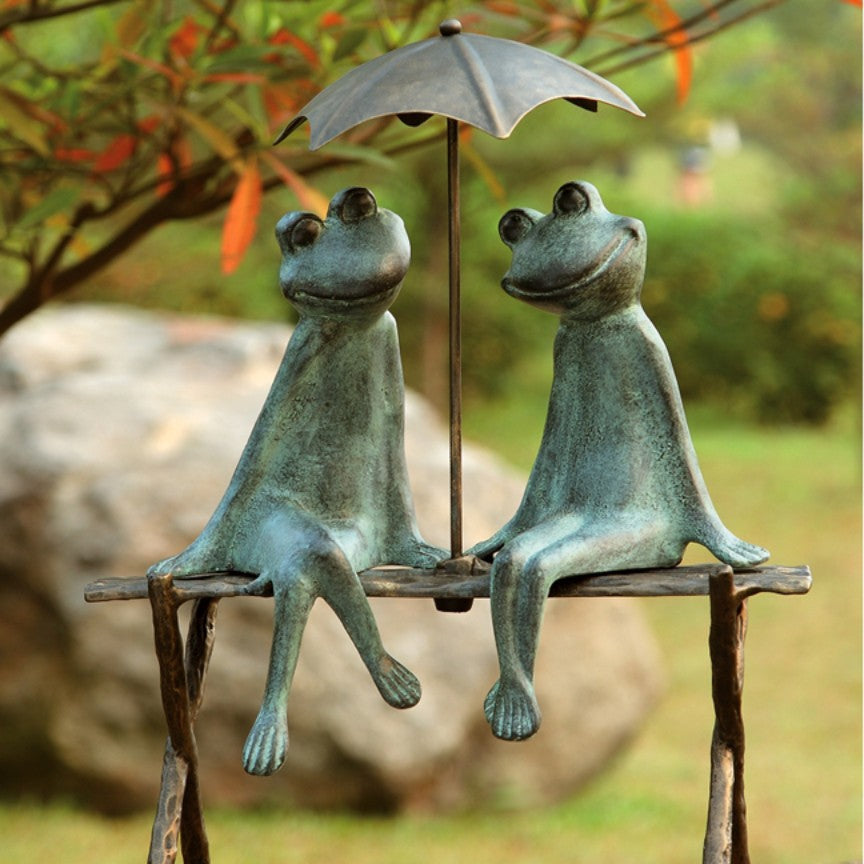 https://www.ironaccents.com/cdn/shop/products/frog-lovers-garden-sculpture-9_1200x.jpg?v=1613592734